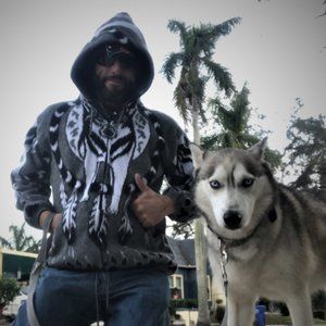 Meet your Posher, Jason and his husky Boomer
